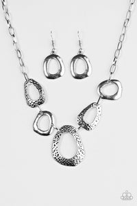 Paparazzi "Very CAVE-alier" Silver Necklace & Earring Set Paparazzi Jewelry