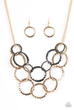 Paparazzi "Radiant Ringmaster" Multi Gold and Black Gunmetal Hammered Ring Necklace & Earring Set Paparazzi Jewelry