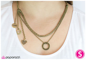 Paparazzi "Pulling at My Heartstrings" Brass Necklace & Earring Set Paparazzi Jewelry