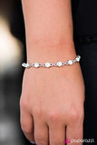 Paparazzi "Hold On To Your SPARKLE!" White Bracelet Paparazzi Jewelry